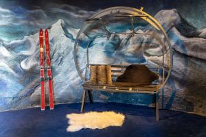 a room with a bird cage and a wall at ho36 La Plagne in La Plagne