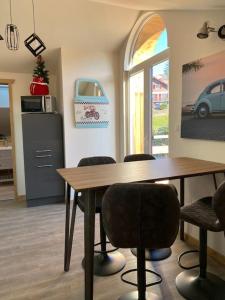 Kuchyňa alebo kuchynka v ubytovaní Le Martin Pêcheur - Appartement + 13 fotografií