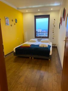 Posteľ alebo postele v izbe v ubytovaní Sunny Life Apartment