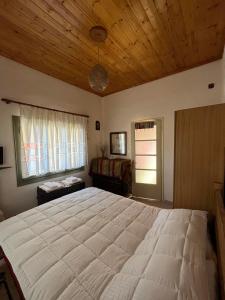 A bed or beds in a room at Sweet home