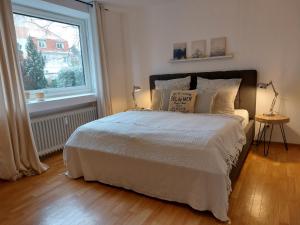 Giường trong phòng chung tại Ferienwohnung Wiesengrund 2