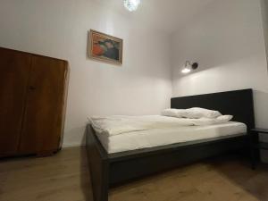 Posteľ alebo postele v izbe v ubytovaní BISCHOFSBERG Gdańsk City Center Apartments