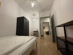 Posteľ alebo postele v izbe v ubytovaní BISCHOFSBERG Gdańsk City Center Apartments