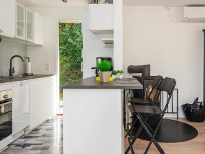 Kuchyň nebo kuchyňský kout v ubytování Holiday home Ebeltoft CCII