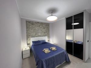 Gulta vai gultas numurā naktsmītnē Luxury Apartment Orlando