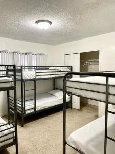 Postel nebo postele na pokoji v ubytování Miami House