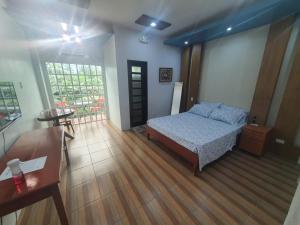 Postel nebo postele na pokoji v ubytování Ohana Hometel + 18 fotografií