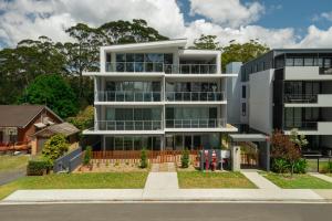 an image of a large white building at The View by Experience Jervis Bay in Huskisson