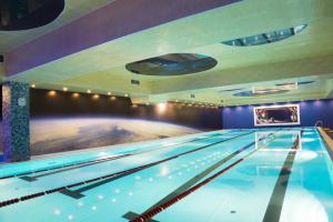 a swimming pool in a hotel room with a swimming pool at Hotel Salut in Moscow