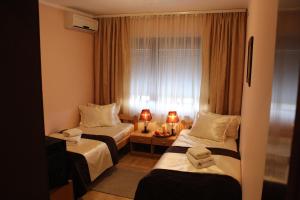 Ein Bett oder Betten in einem Zimmer der Unterkunft Guest Accommodation Zone