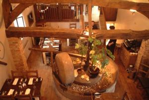 an overhead view of a living room with a plant at Steppes Farm Cottages in Monmouth