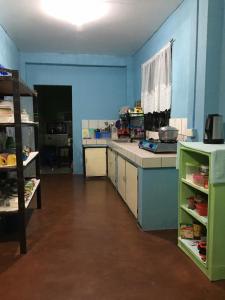 Kuchyň nebo kuchyňský kout v ubytování Vilma's Homestay + 28 fotografií
