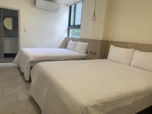 Letto o letti in una camera di Smile Ocean Homestay