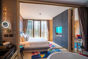 Hotel Indigo Phuket Patong by IHG客房内的一张或多张床位