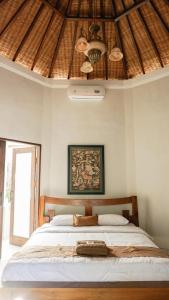 Krevet ili kreveti u jedinici u okviru objekta Villa Dende Lombok