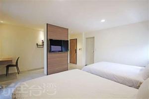 Letto o letti in una camera di Smile Ocean Homestay