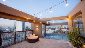 a house with a swimming pool on the roof at Celine Living - Central in Ho Chi Minh City