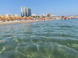 a view of the beach from the water at Faleza Nord apartament de lux nou pe malul marii in Constanţa