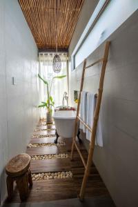 Koupelna v ubytování Ahana Resort El Nido