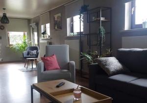 Χώρος καθιστικού στο Vakantiewoning - ‘t Ouwershuys