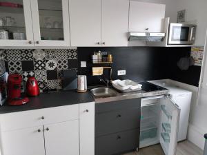 Kuchyň nebo kuchyňský kout v ubytování La détente 2 etoiles