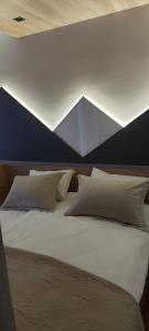 Letto o letti in una camera di Borovi snovi Divčibare