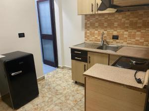 Kuchyň nebo kuchyňský kout v ubytování Cappuccino City Center Apartment + 2 fotografie