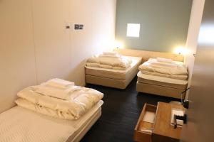 Postel nebo postele na pokoji v ubytování Hostel Tomar + 37 fotografií