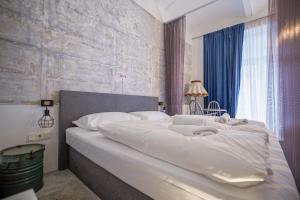 Posteľ alebo postele v izbe v ubytovaní easy flat Augarten