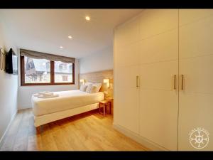 Llit o llits en una habitació de SANTA MARGALIDA de Alma de Nieve