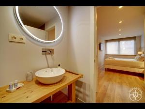 A bed or beds in a room at SANTA MARGALIDA de Alma de Nieve