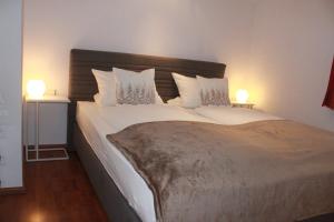 Letto o letti in una camera di Edelweiss Apartments 200m zum Lift - Silvretta Card Premium Inklusive