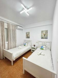 Posteľ alebo postele v izbe v ubytovaní Apartamento en el centro de Malaga, en el Soho