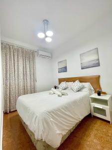 Posteľ alebo postele v izbe v ubytovaní Apartamento en el centro de Malaga, en el Soho