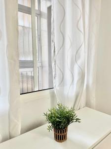 Posteľ alebo postele v izbe v ubytovaní Apartamento en el centro de Malaga, en el Soho