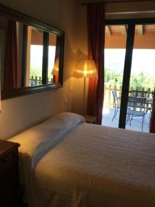 A bed or beds in a room at Podere Capitignano
