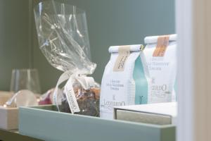 a box with a glass trophy and other items at Hotel La Gemma in Florence