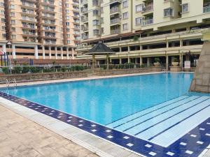 a large swimming pool in front of a building at 3 rooms PV3 at DANAU KOTA SETAPAK in Kuala Lumpur
