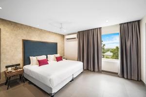 Postel nebo postele na pokoji v ubytování Regency Tuticorin by GRT Hotels