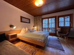 Łóżko lub łóżka w pokoju w obiekcie Apartment Knaushof by Interhome