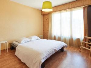 מיטה או מיטות בחדר ב-Apartment Mirabeau by Interhome