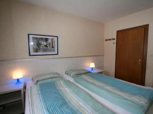 Postel nebo postele na pokoji v ubytování Chalet Amberg by Interhome