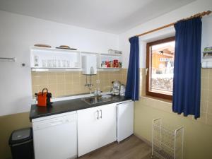 Kuchyň nebo kuchyňský kout v ubytování Chalet Amberg by Interhome