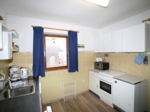 Kuchyň nebo kuchyňský kout v ubytování Chalet Amberg by Interhome