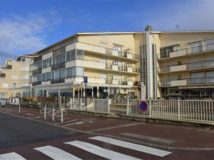 an empty street in front of a building at Apartment Le Grand Large by Interhome in Capbreton