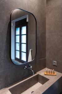 Kúpeľňa v ubytovaní Naillac Elite Suites