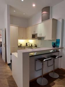 Kuhinja oz. manjša kuhinja v nastanitvi Apartment Inner City by Interhome