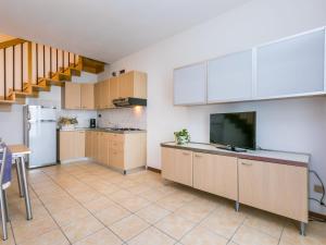 A kitchen or kitchenette at Apartment Robinia-Pinetine-2 by Interhome Még 24 kép