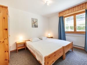 Ένα ή περισσότερα κρεβάτια σε δωμάτιο στο Apartment Hameau D1 by Interhome