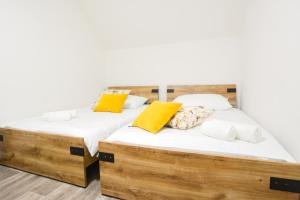 Postel nebo postele na pokoji v ubytování Apartmány Victory Residence